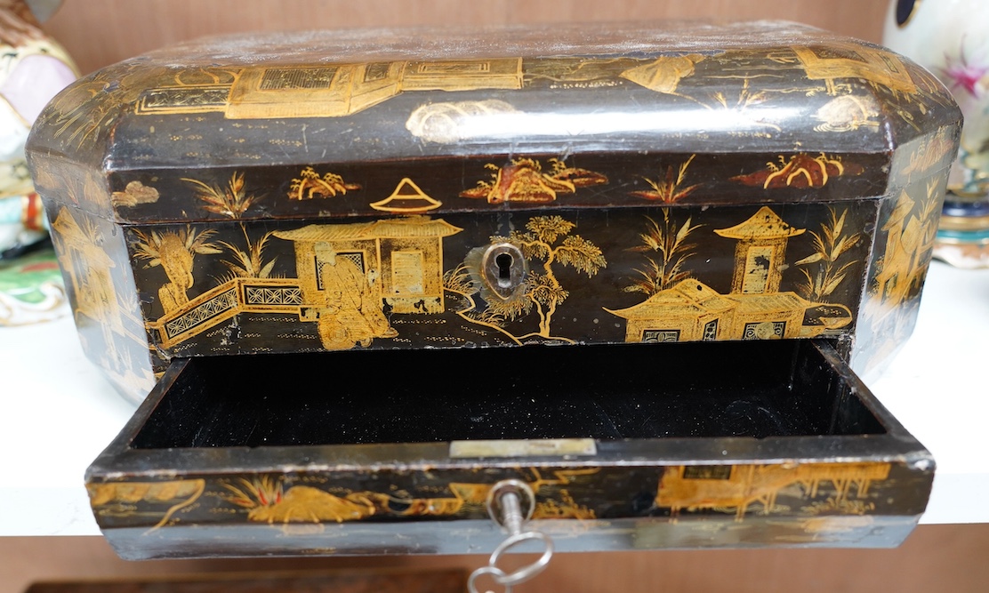 A 19th century Chinese lacquered sewing box, 33.5cm wide. Condition - fair, generally worn